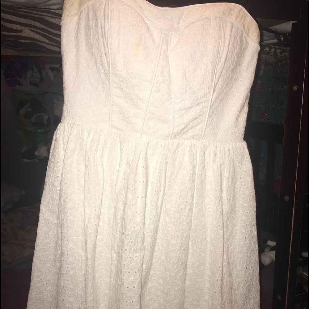 Cute white above the knee dress.
